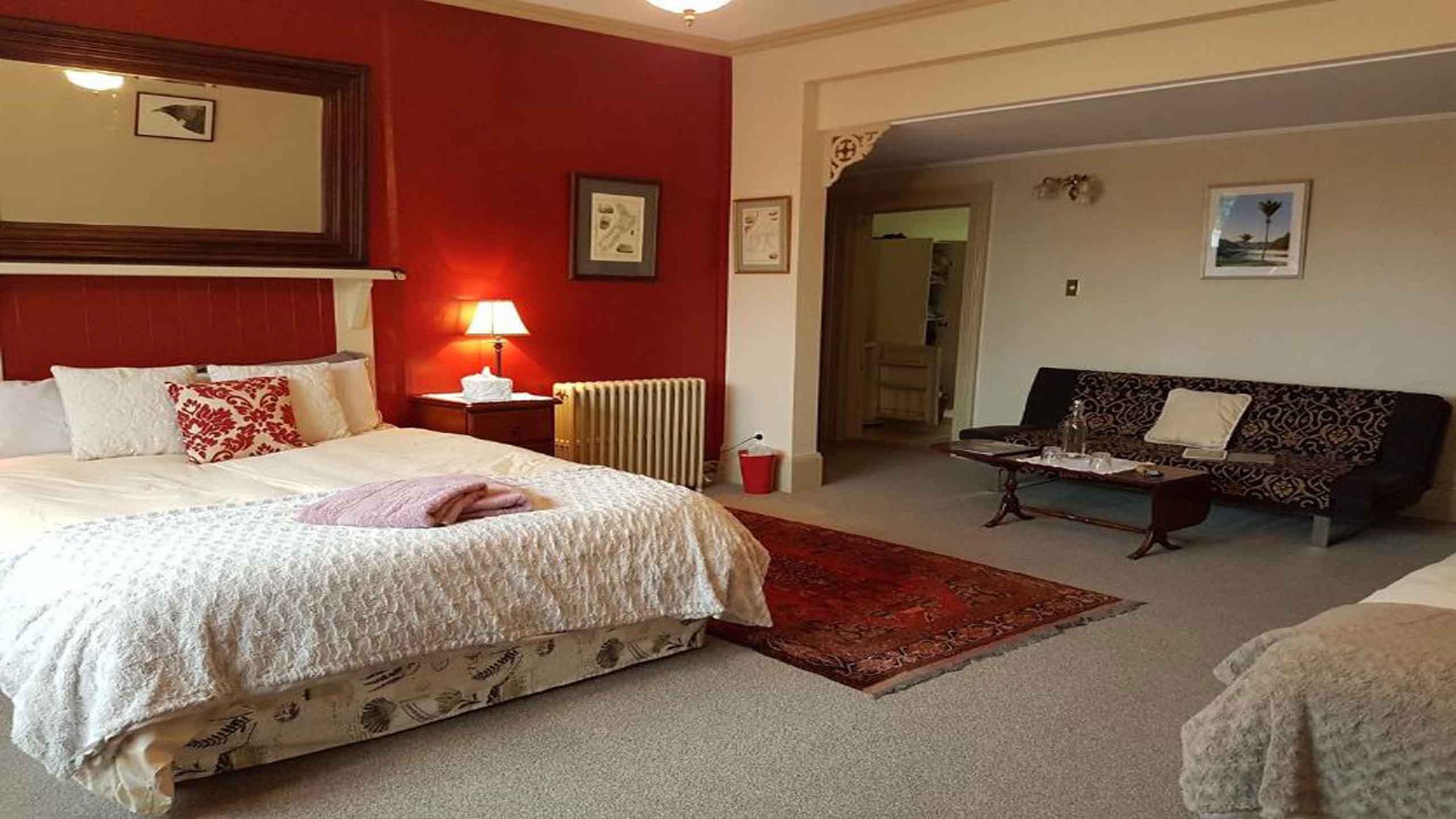 warwick-house-nelson-new-zealand-red-bedroom-overview