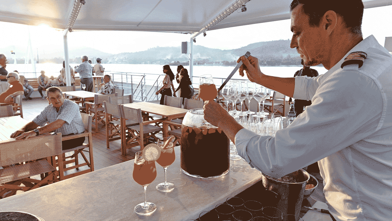 coral-adventurer-serving-sunset-drinks