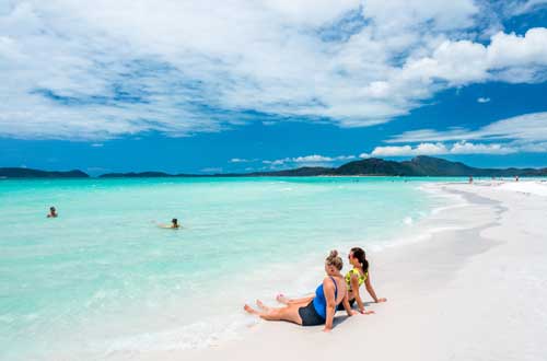 sitting-on-whitehaven-beach-queensland-australia